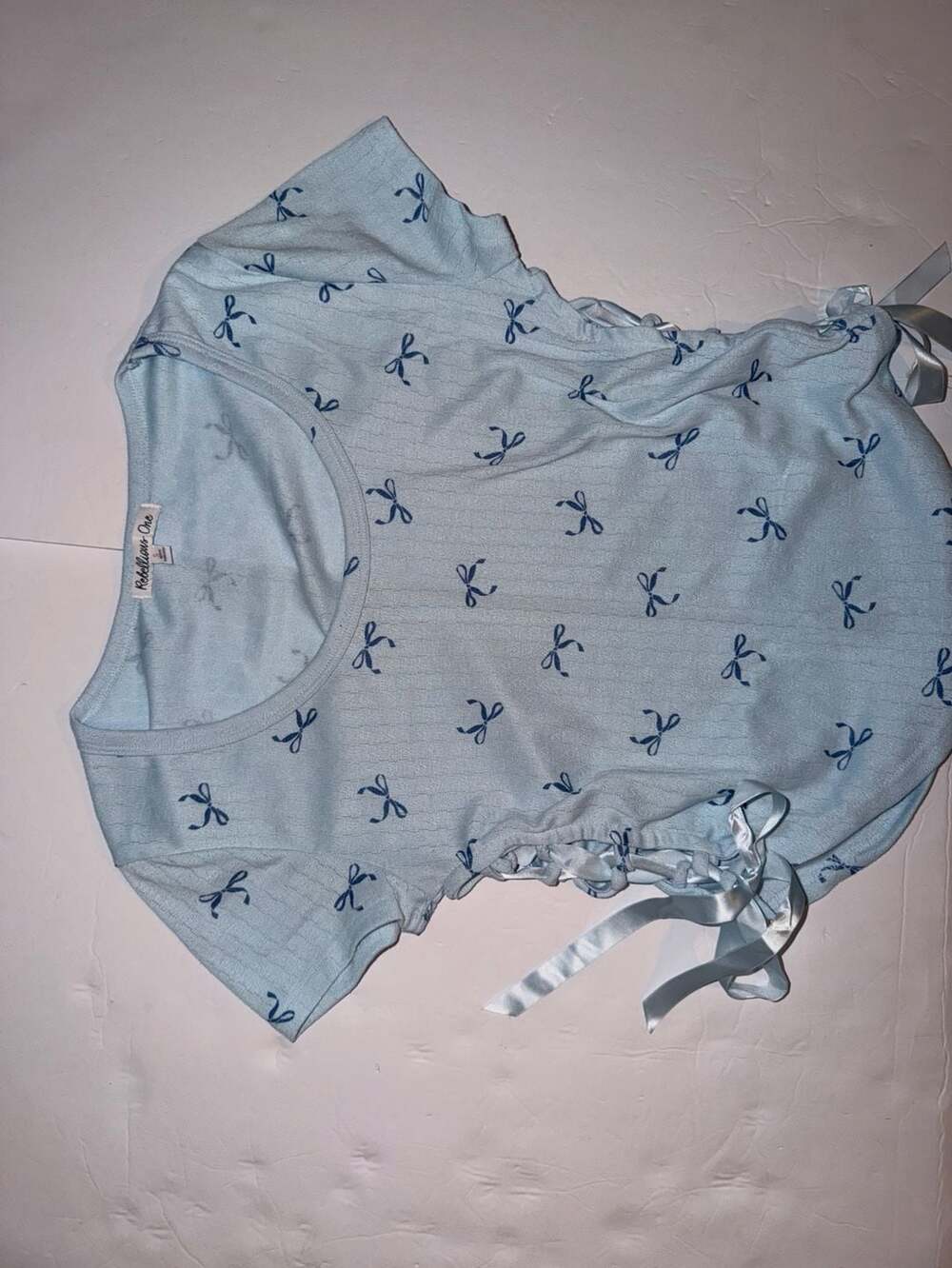 Rebellious One Juniors Printed Ribbon-Side Short-Sleeve Tee in Blue